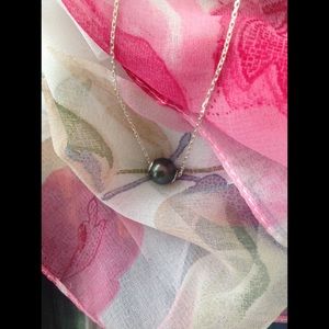 9mm black Fresh Water Pearl pendant on 18" chain